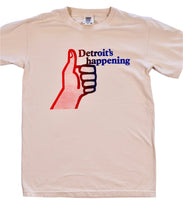 Vintage-style cream shirt featuring Detroit's Happening text and a red thumbs-up graphic.